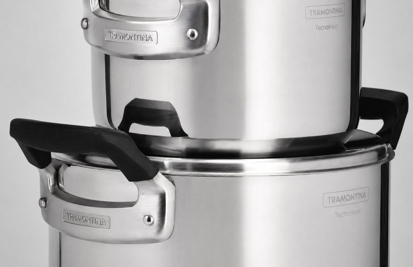 Tramontina TecnoHeat, Tramontina lonci, set inox lonaca, inox lonci s poklopcem, Made in Brazil, brazilski lonci, inox posuđe, set posuđa, lonci za indukciju, indukcijski lonci, lonci za plin, lonci za električni štednjak, lonci za staklokeramiku, troslojno dno, tri ply dno, inox kuhinjsko posuđe, kvalitetni lonci, profesionalni lonci, premium inox posuđe, kuhinjski lonci, set od 3 lonca, Tramontina Hrvatska, inox lonac s poklopcem, moderno posuđe, posuđe za kuhanje, dugotrajni lonci, energetski učinkovito 