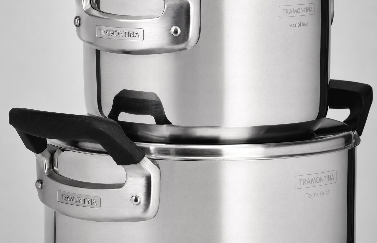 Tramontina TecnoHeat, Tramontina lonci, set inox lonaca, inox lonci s poklopcem, Made in Brazil, brazilski lonci, inox posuđe, set posuđa, lonci za indukciju, indukcijski lonci, lonci za plin, lonci za električni štednjak, lonci za staklokeramiku, troslojno dno, tri ply dno, inox kuhinjsko posuđe, kvalitetni lonci, profesionalni lonci, premium inox posuđe, kuhinjski lonci, set od 3 lonca, Tramontina Hrvatska, inox lonac s poklopcem, moderno posuđe, posuđe za kuhanje, dugotrajni lonci, energetski učinkovito 