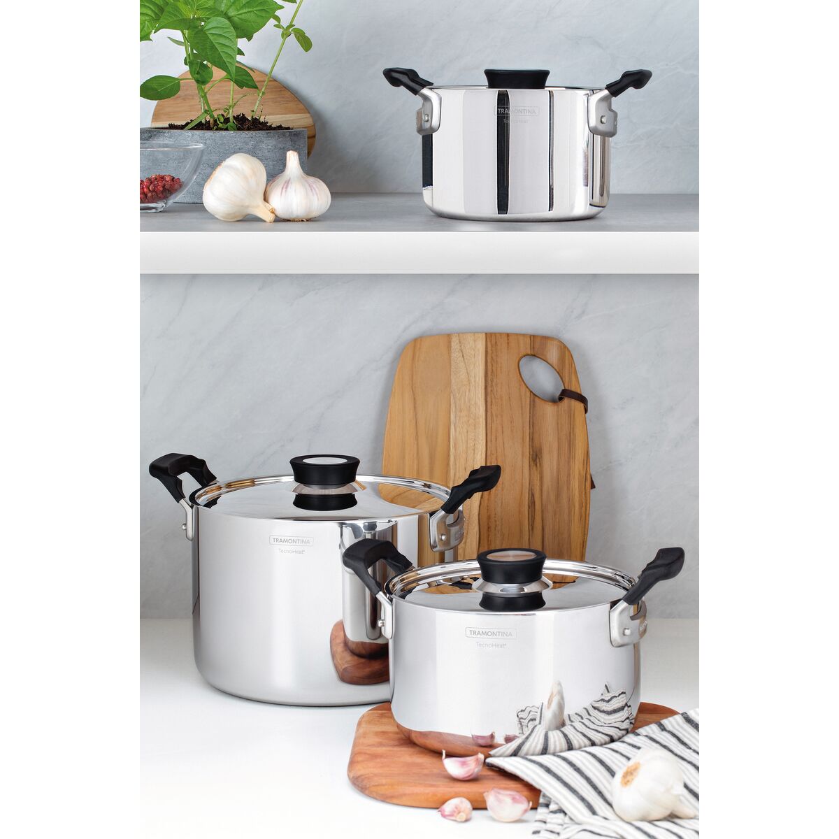 Tramontina TecnoHeat, Tramontina lonci, set inox lonaca, inox lonci s poklopcem, Made in Brazil, brazilski lonci, inox posuđe, set posuđa, lonci za indukciju, indukcijski lonci, lonci za plin, lonci za električni štednjak, lonci za staklokeramiku, troslojno dno, tri ply dno, inox kuhinjsko posuđe, kvalitetni lonci, profesionalni lonci, premium inox posuđe, kuhinjski lonci, set od 3 lonca, Tramontina Hrvatska, inox lonac s poklopcem, moderno posuđe, posuđe za kuhanje, dugotrajni lonci, energetski učinkovito 